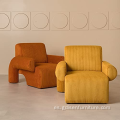 Sillón de tela para sala de estar